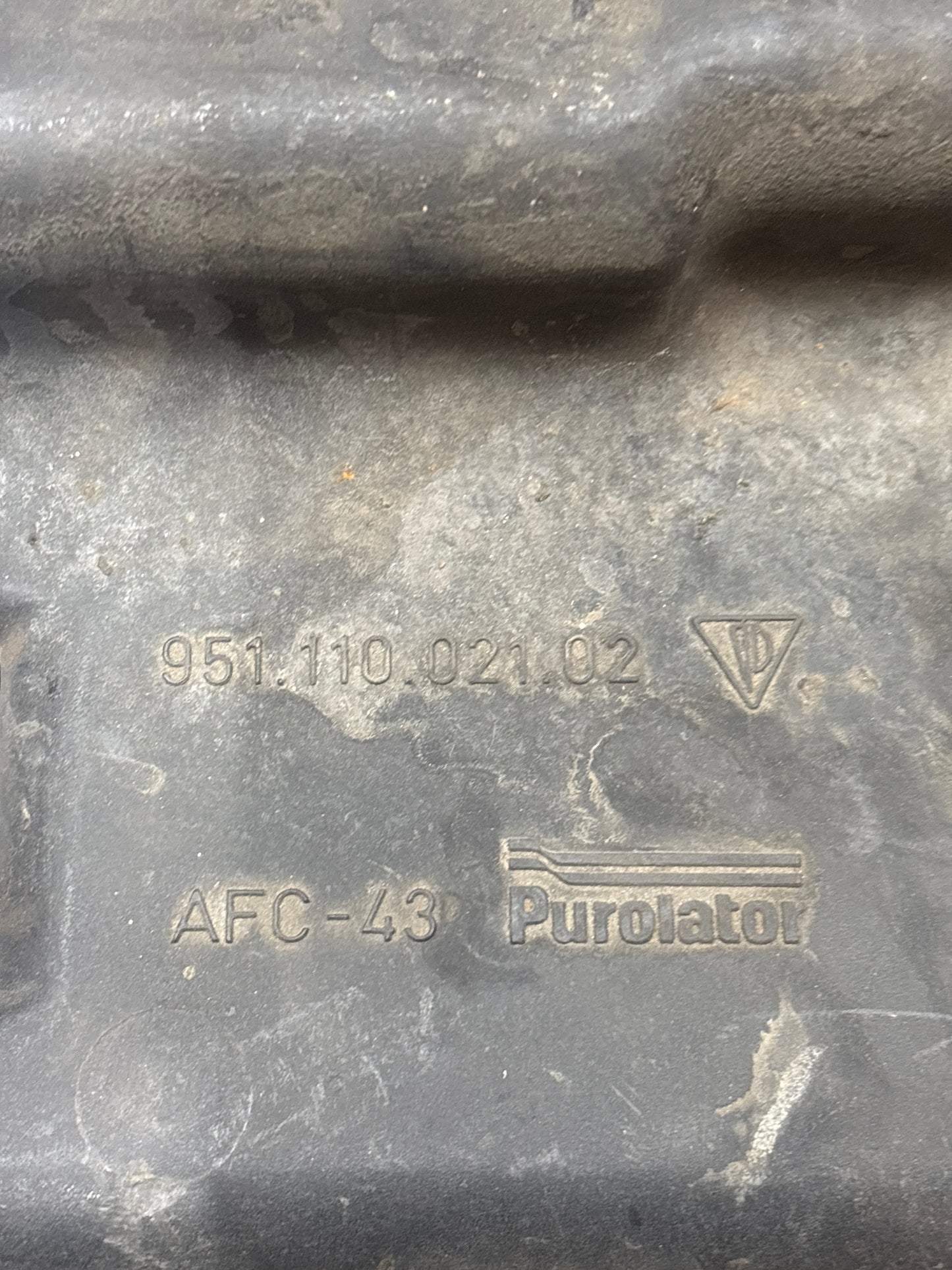 Porsche 944 Turbo air filter housing bottom part, 95111002102, used spares or repair