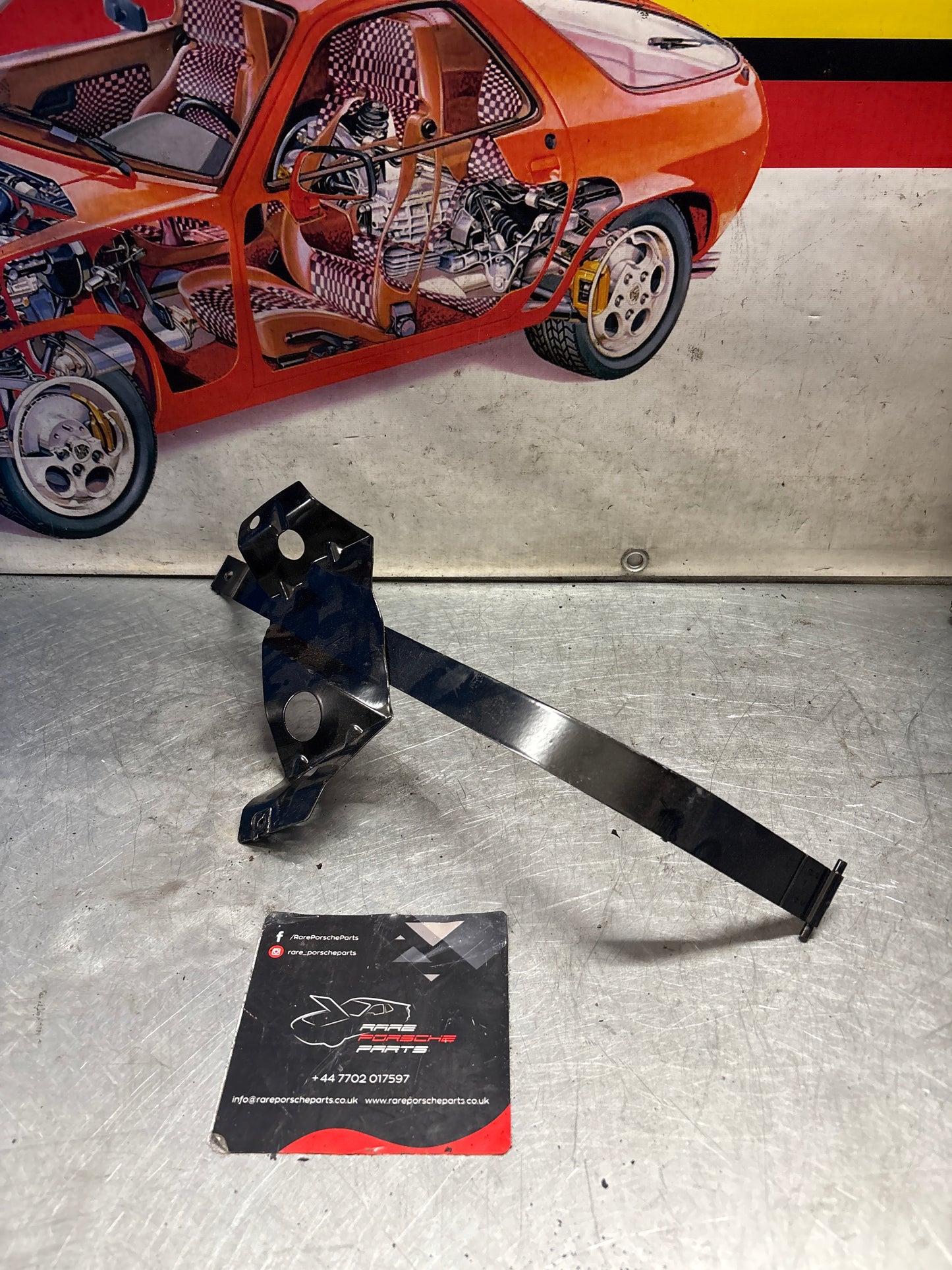 Porsche 944 S2 / Turbo 90- left fuel tank restraining strap, refurbished 95120131502