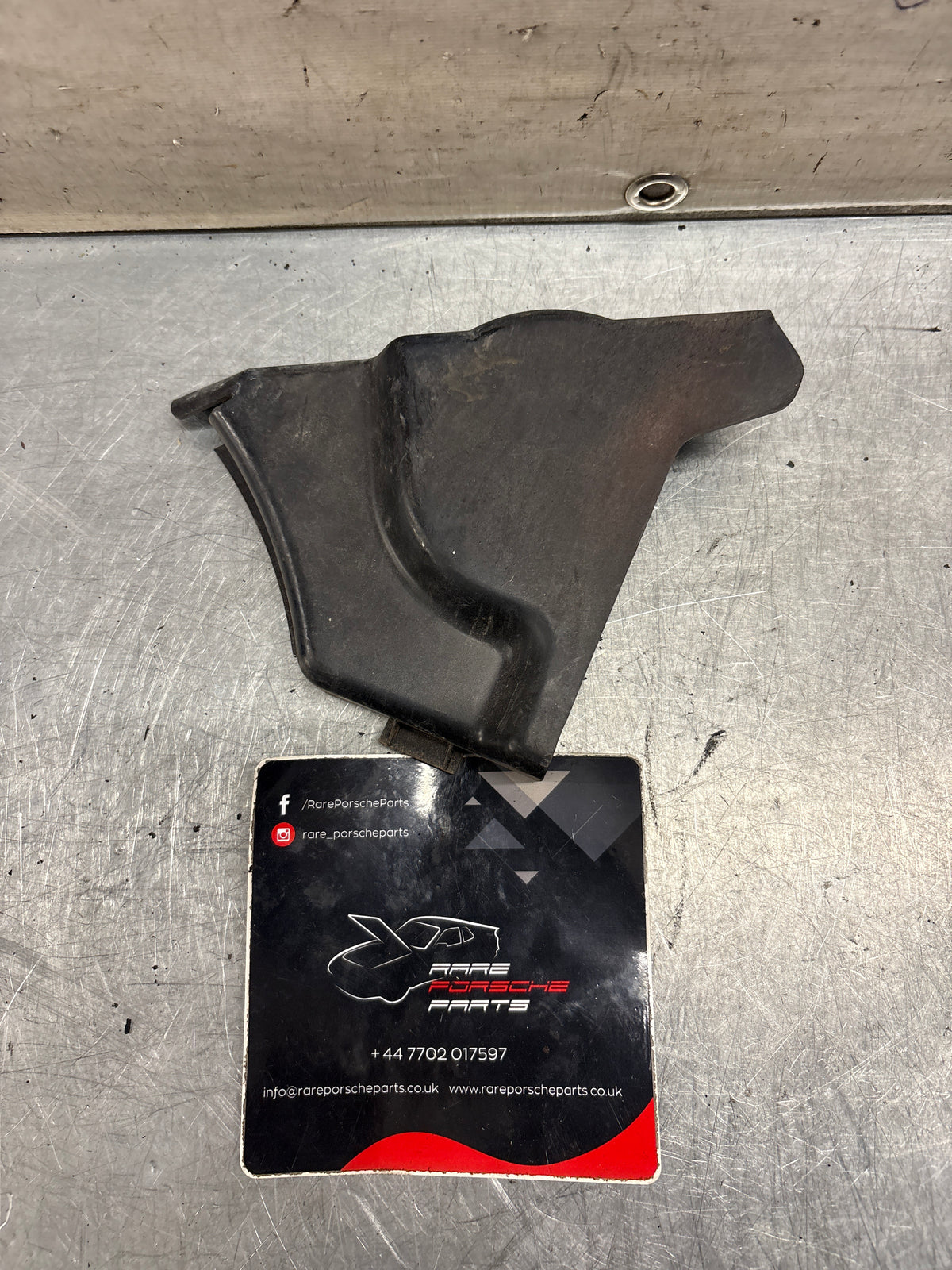 Porsche 914 headlight motor protective plate, left side, used 91475019510