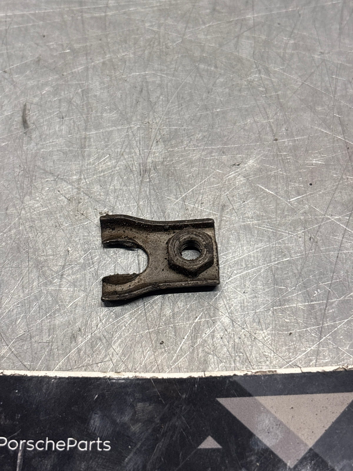 Porsche 914 clutch release fork retaining plate, used 90111607701
