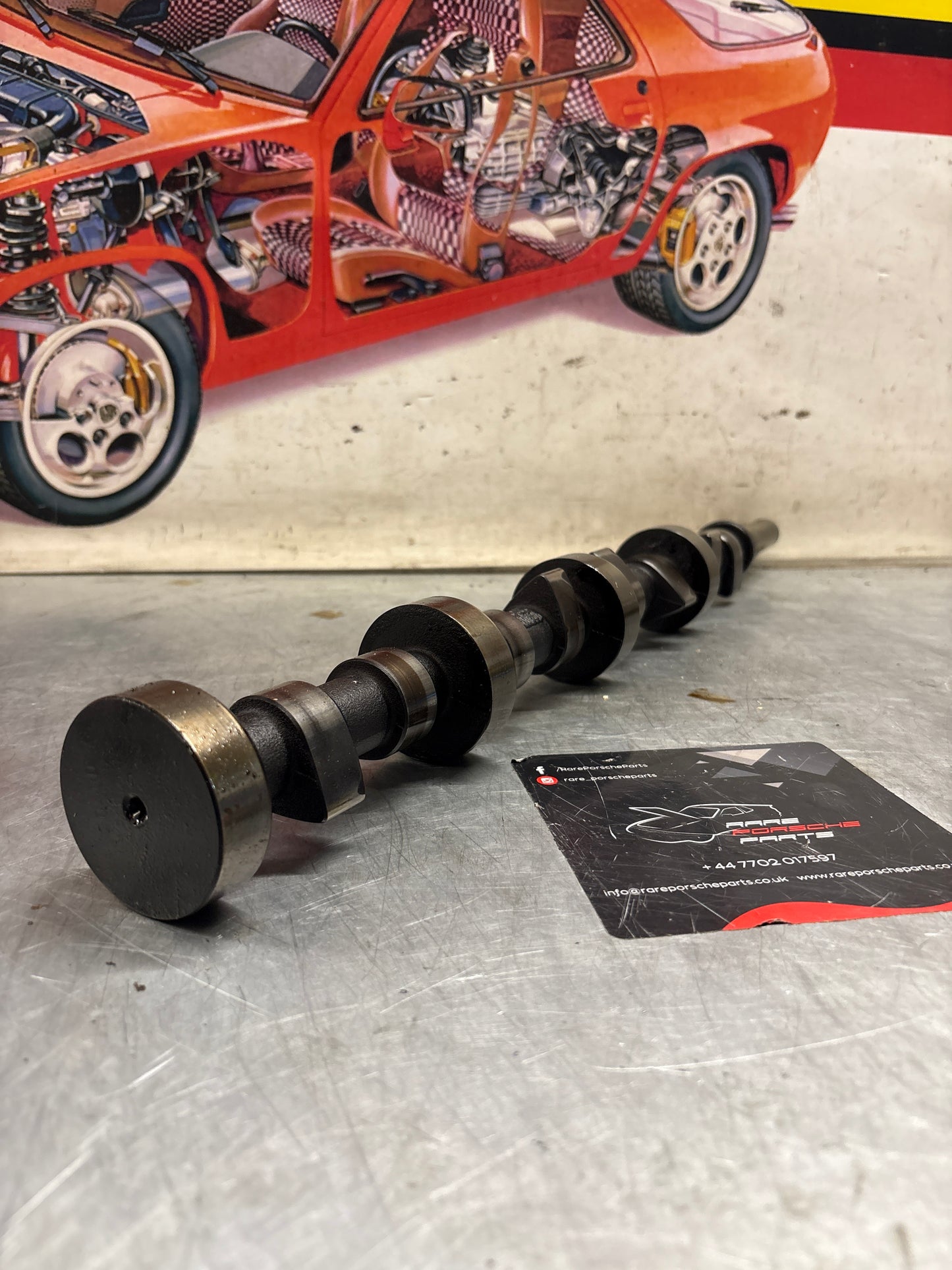 Porsche 928 cam shaft, used 9281052040R