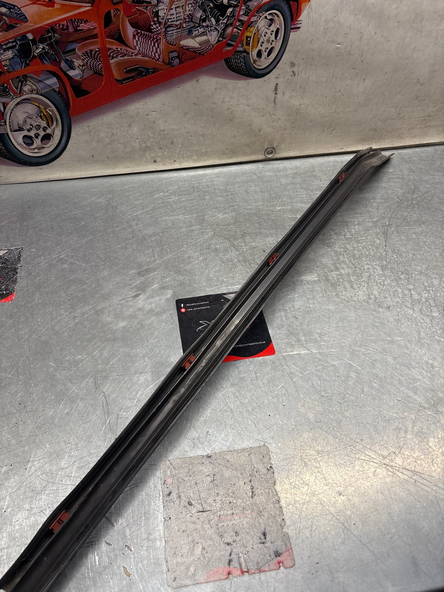 Porsche early 924/944 left sill trim, used 477853657A