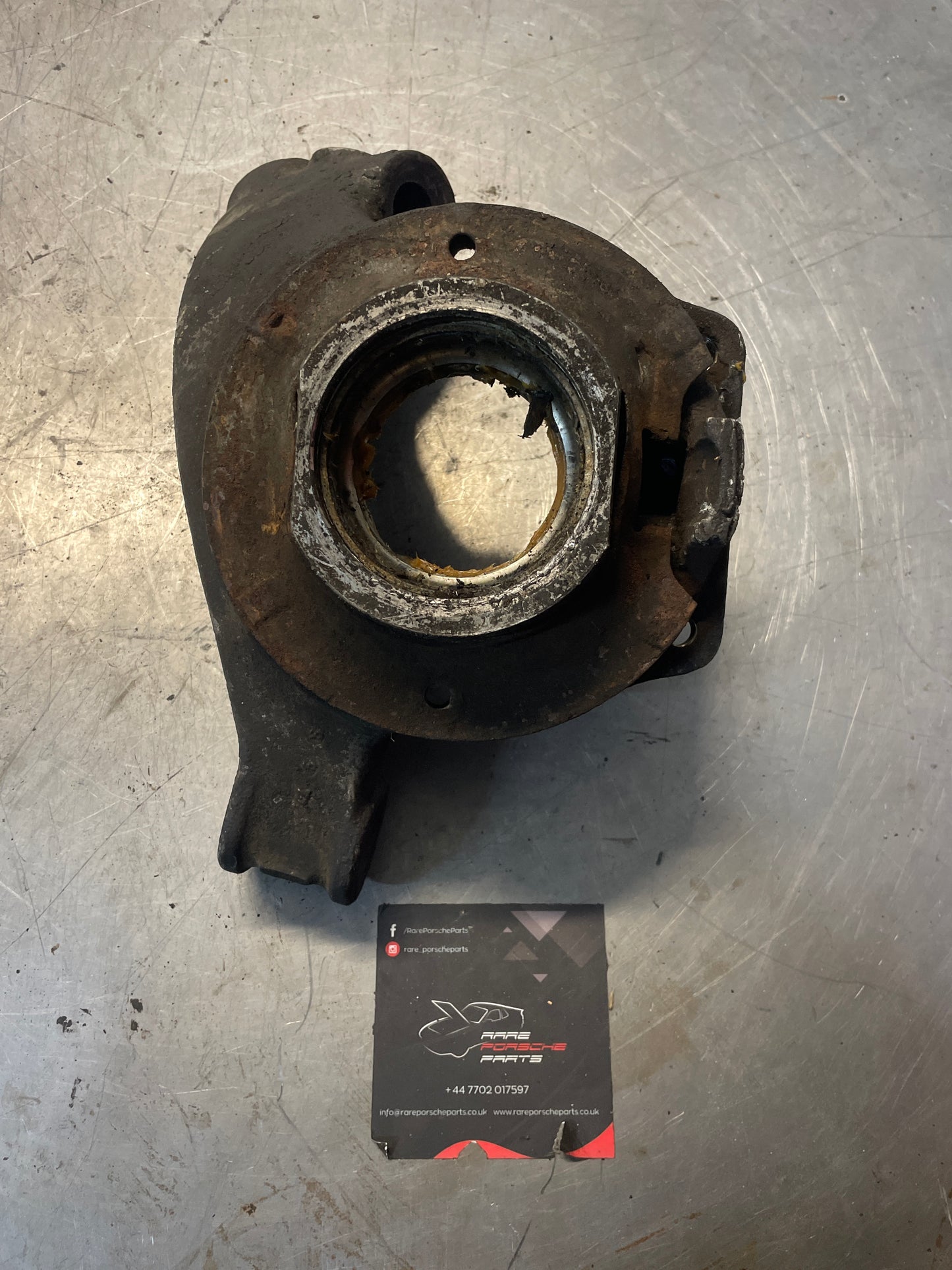 Porsche 928 rear left wheel hub carrier, used 9283312174R