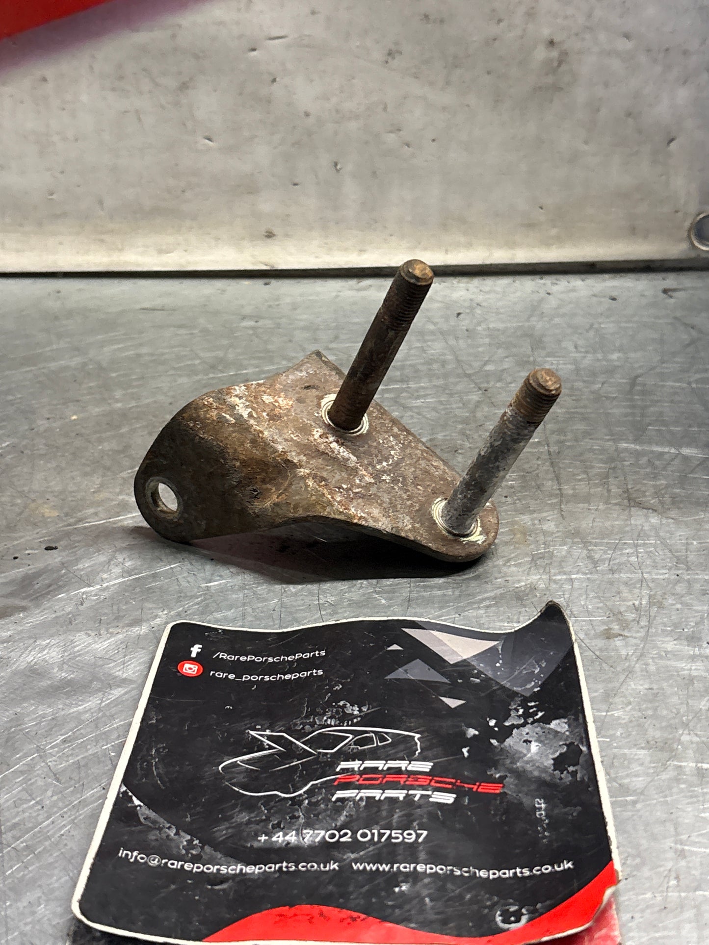 Porsche 928S/S4 Wishbone stabilizer bracket, left, used 92834109105