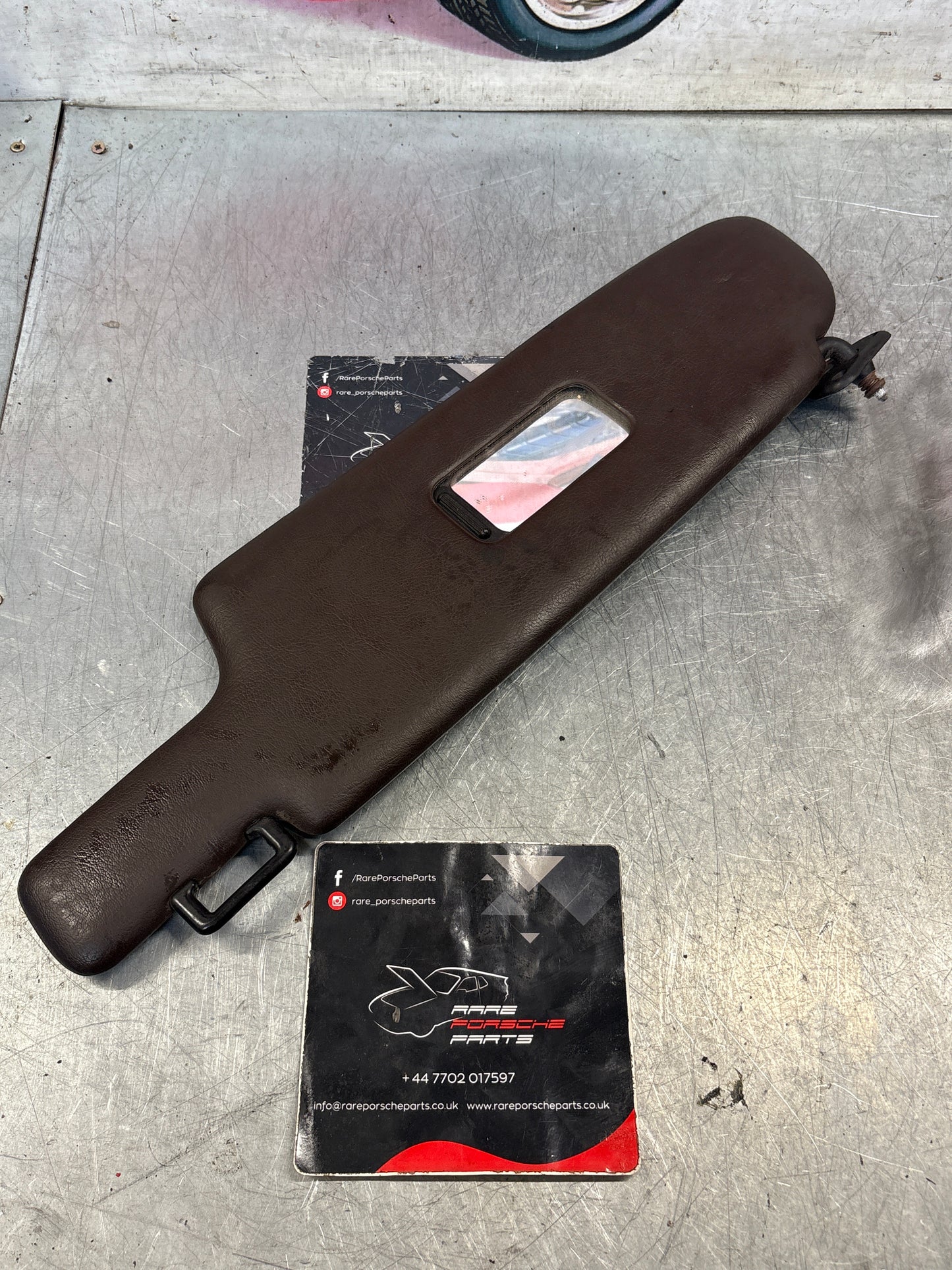 Porsche 928 burgundy sun visor, used left 92873123702