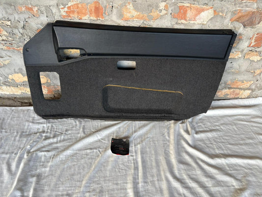 Porsche 944 black/black pinstripe fabric right door card 94455501801 used, very nice condition