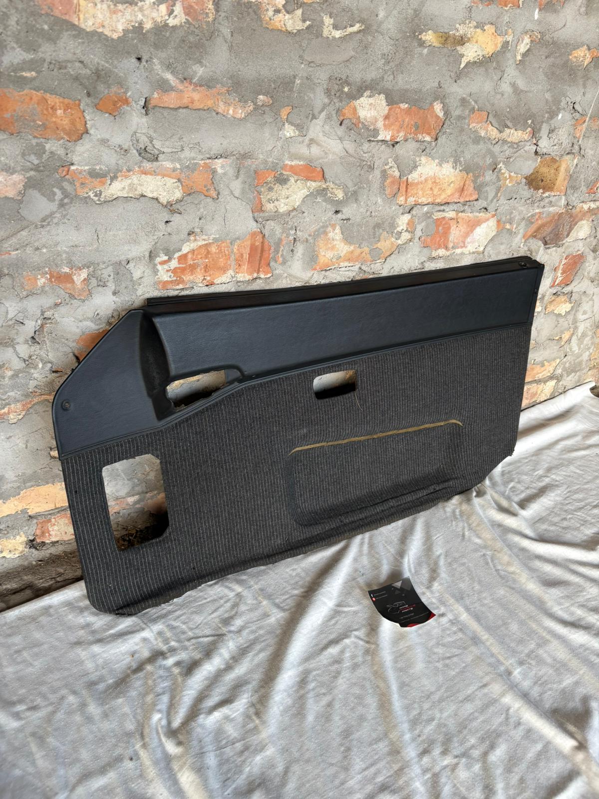 Porsche 944 black/black pinstripe fabric right door card 94455501801 used, very nice condition