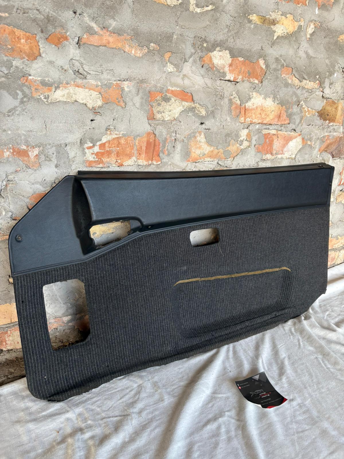 Porsche 944 black/black pinstripe fabric right door card 94455501801 used, very nice condition