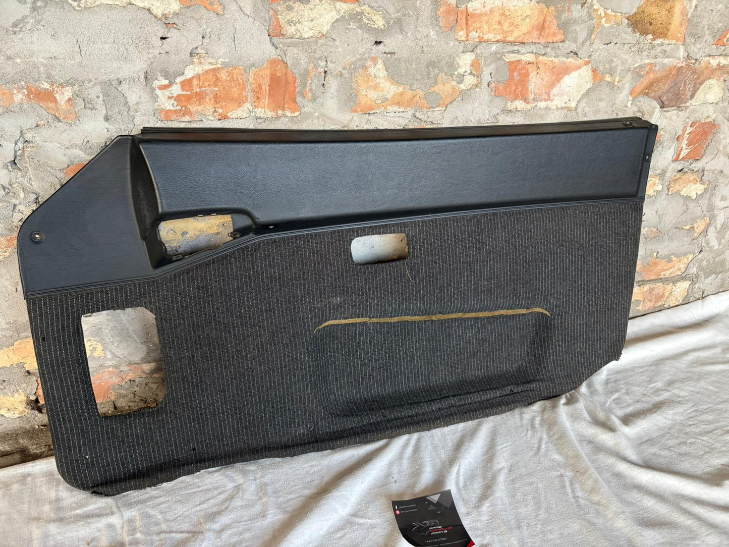 Porsche 944 black/black pinstripe fabric right door card 94455501801 used, very nice condition