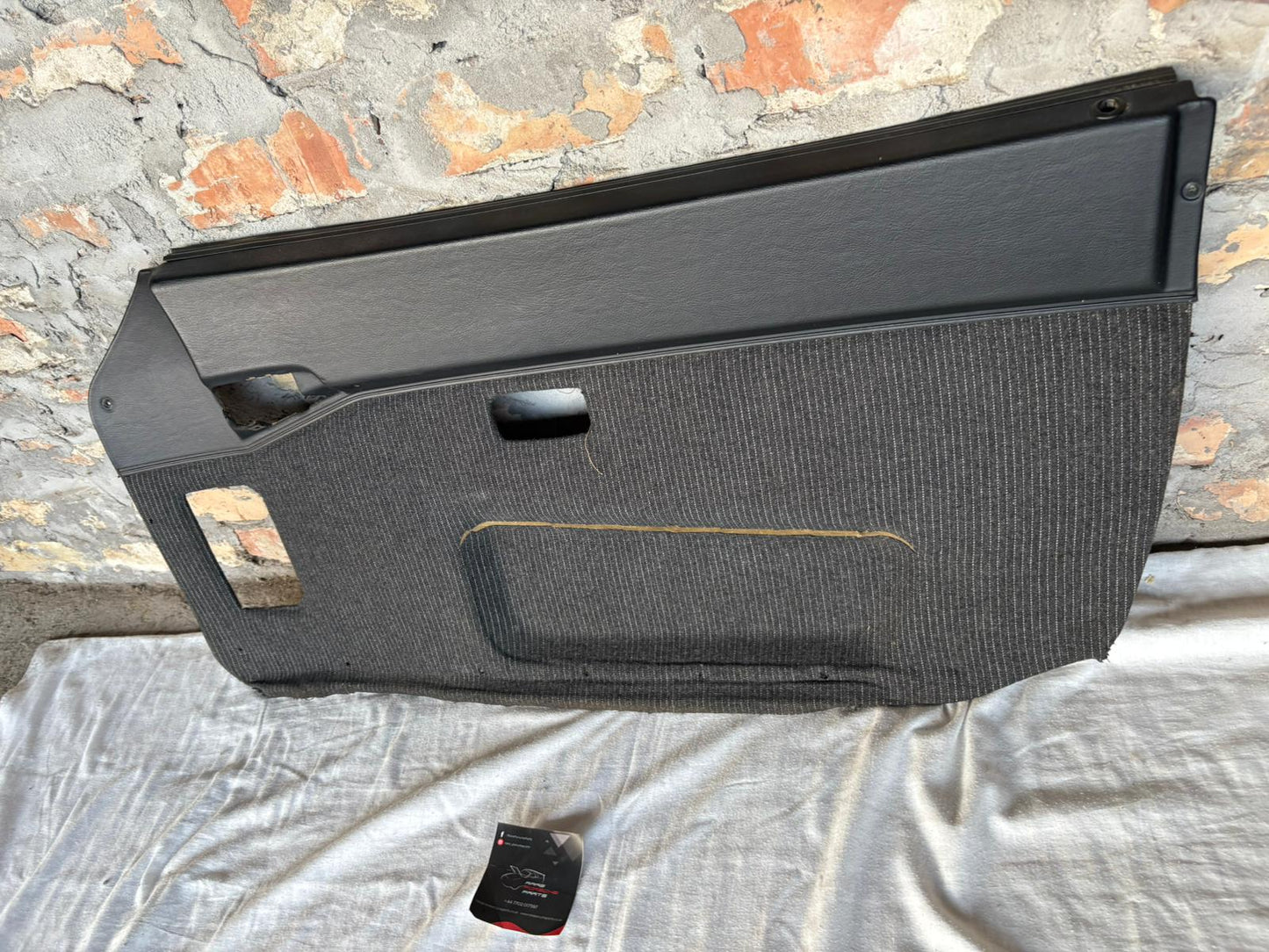 Porsche 944 black/black pinstripe fabric right door card 94455501801 used, very nice condition