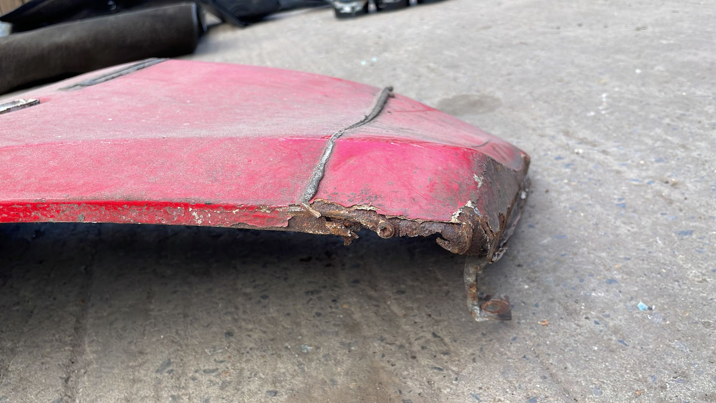 Porsche 944, early front left wing, in need of repair