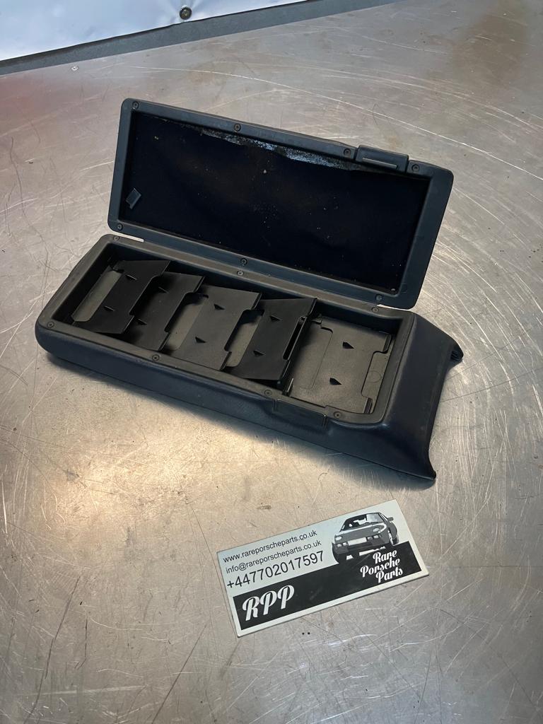 Porsche 928 S4 92855571102 Central armrest cassette compartment black, used