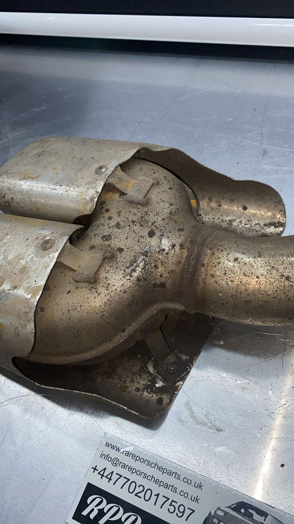 Porsche Cayenne left exhaust tip, used 7P5253681G