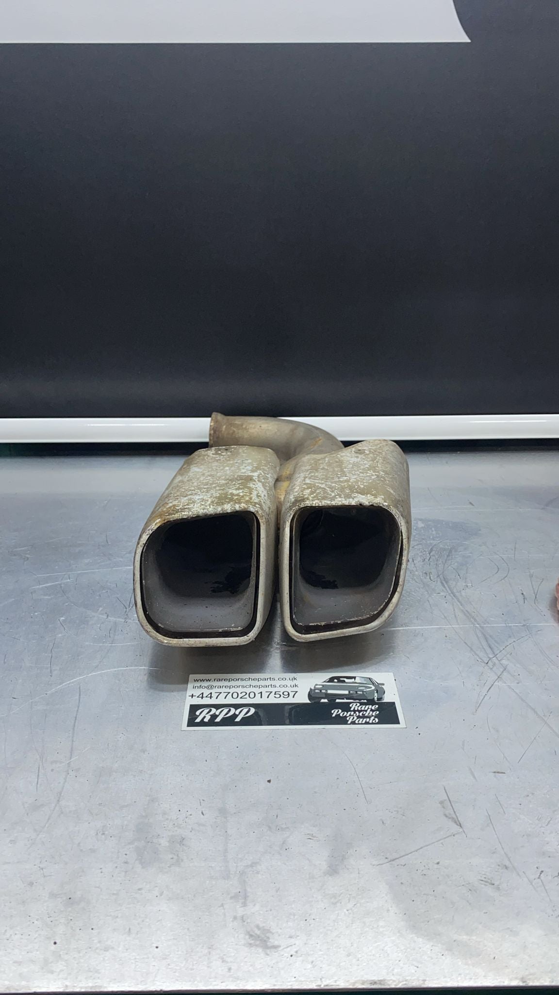 Porsche Cayenne left exhaust tip, used 7P5253681G