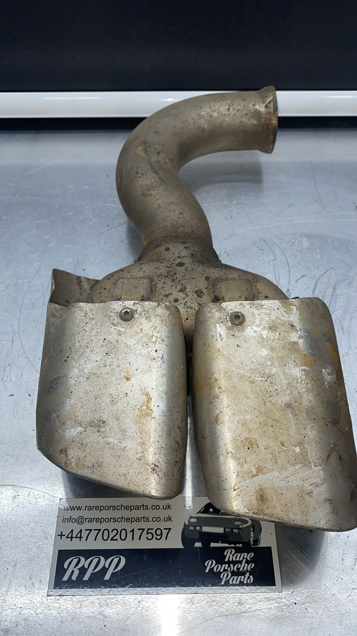 Porsche Cayenne left exhaust tip, used 7P5253681G