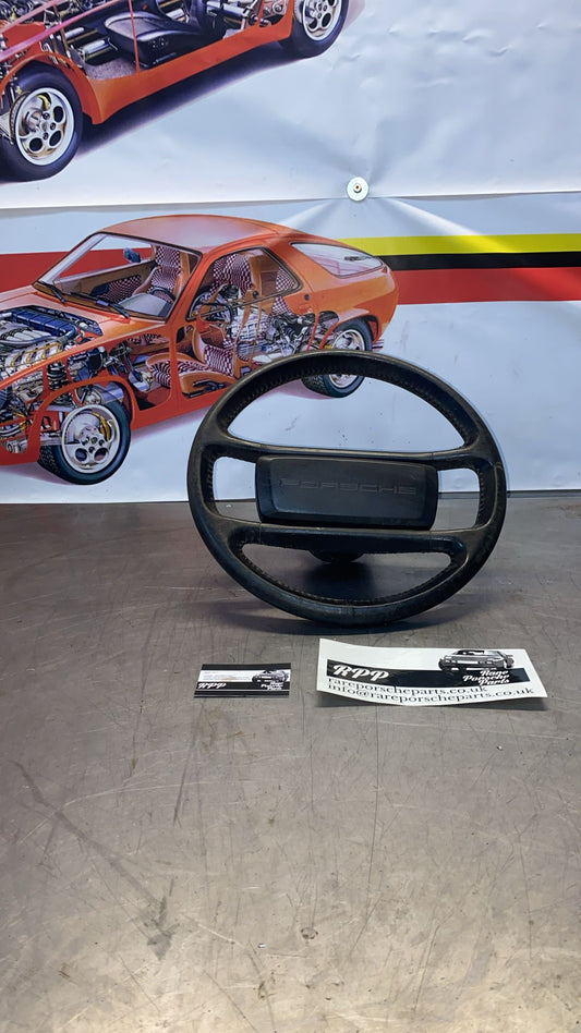 Porsche 944 black leather steering wheel, used 94434708409
