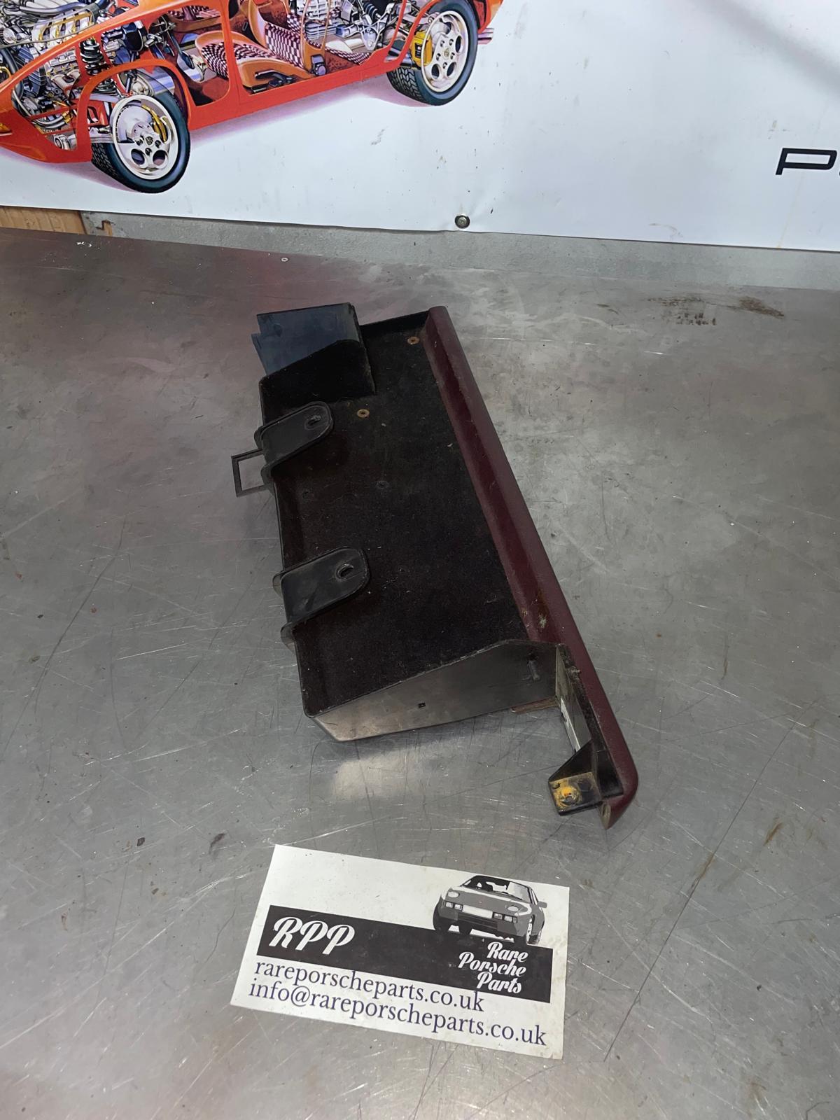 Porsche 928 passenger side under dash storage tray, used burgundy 92755207702