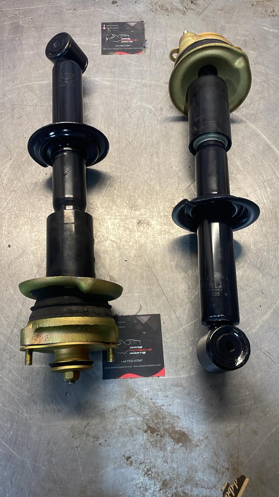 Porsche 928 78-85 pair of front shock absorber with to spring plate, refurbished 92834305504, 92834304708