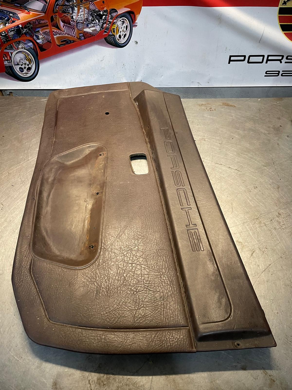 Porsche 924 manual scripted brown door card, right, off side 477867012 spares or repair, please study the photos