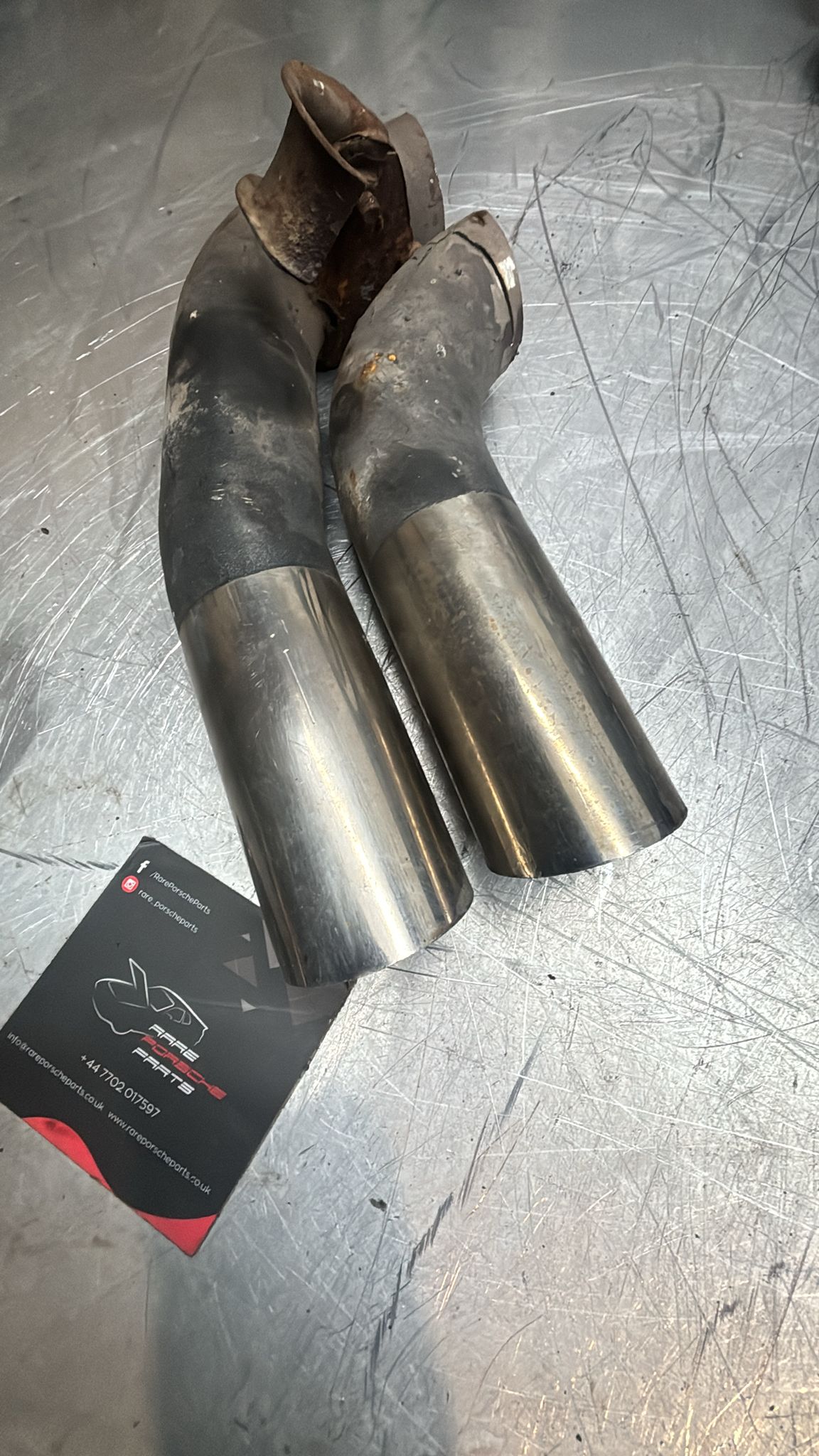 Porsche 928S pair of cut exhaust tips, used 92811127103, spares or repiar