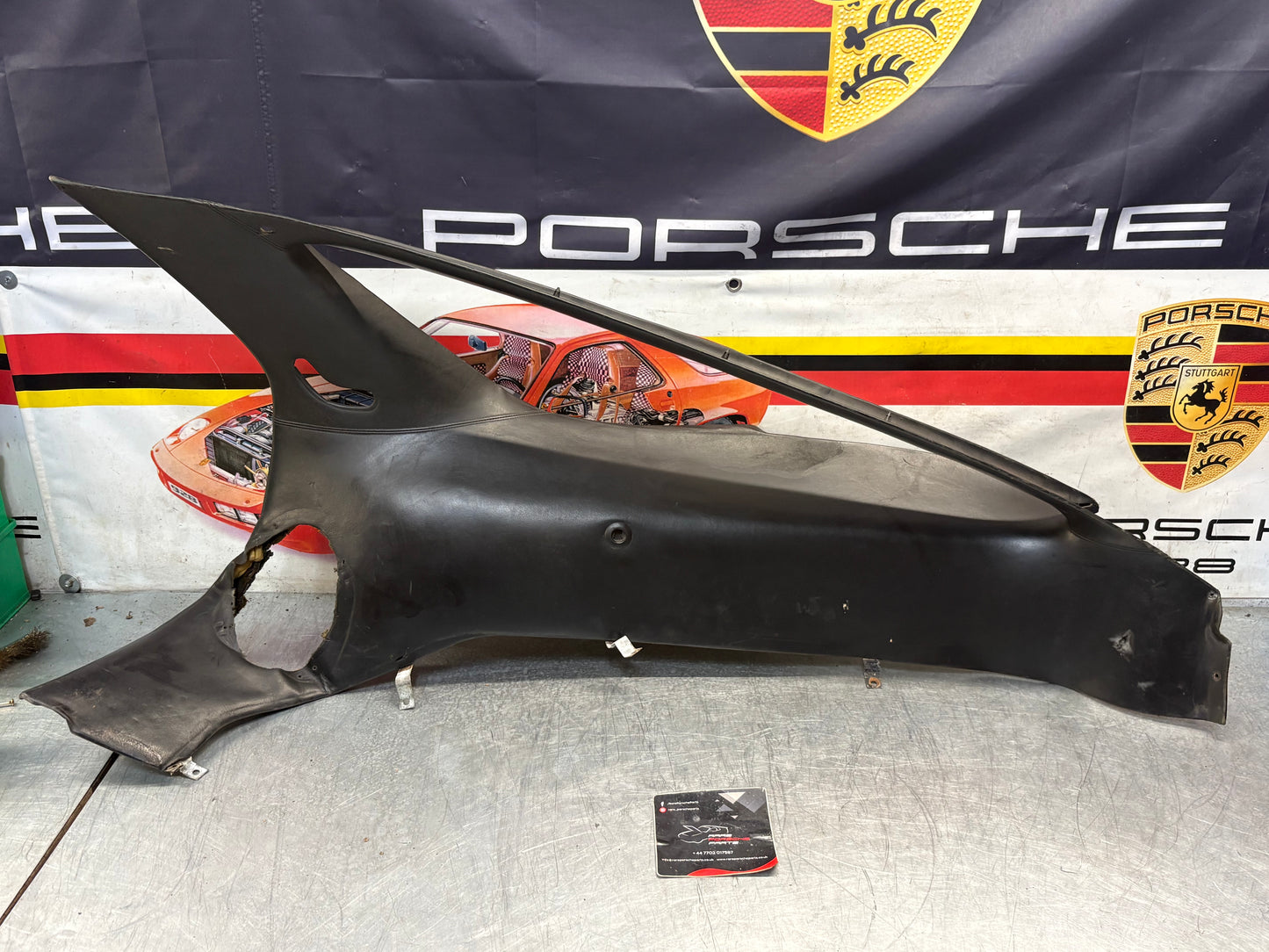 Porsche 928 right side lower side trim panel without loudspeaker, black used 92855502202