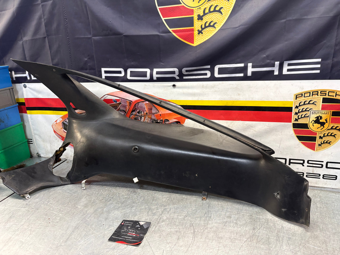 Porsche 928 right side lower side trim panel without loudspeaker, black used 92855502202