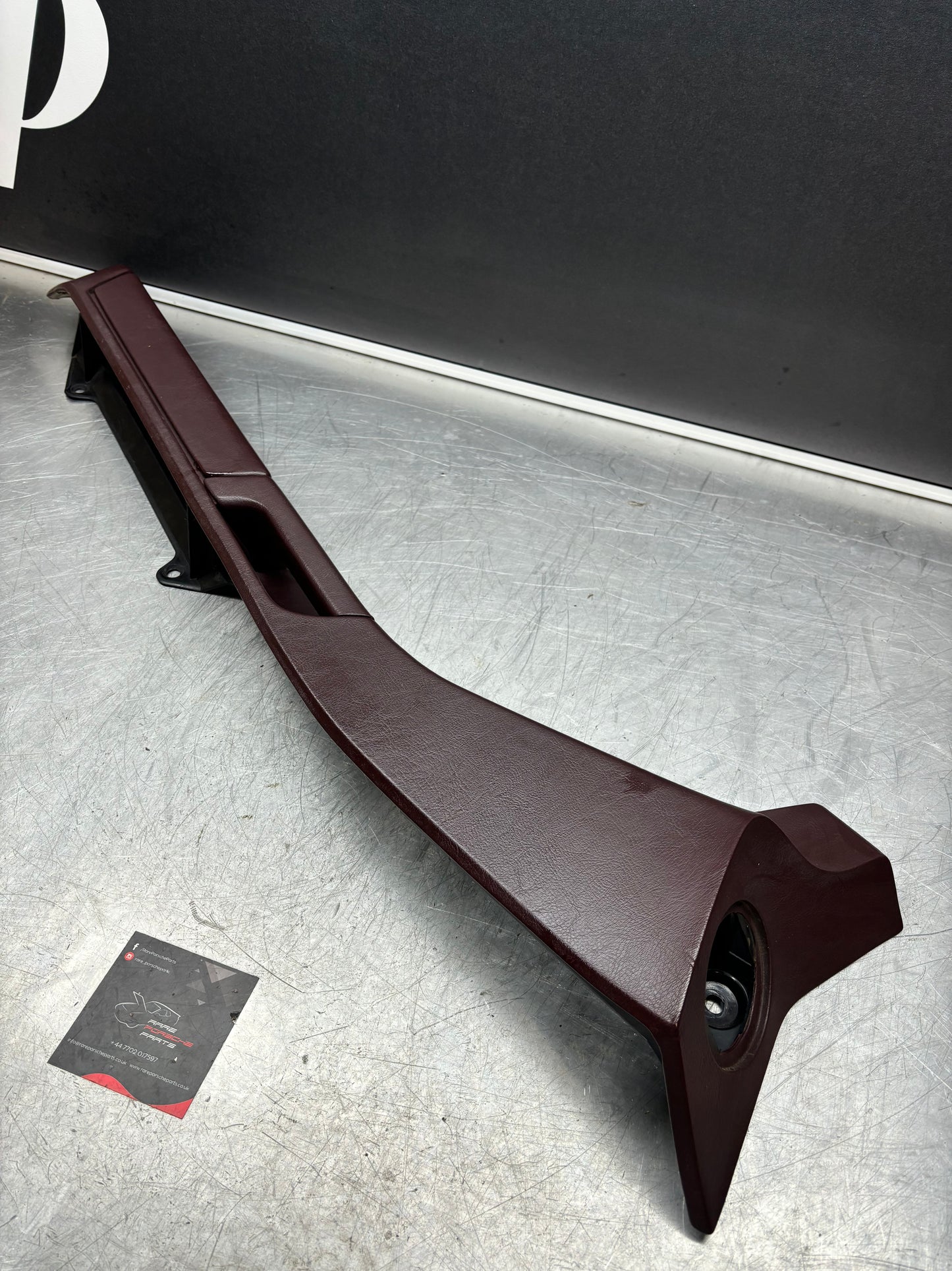 Porsche 928 Burgundy door armrest, left near side 92855590150 used