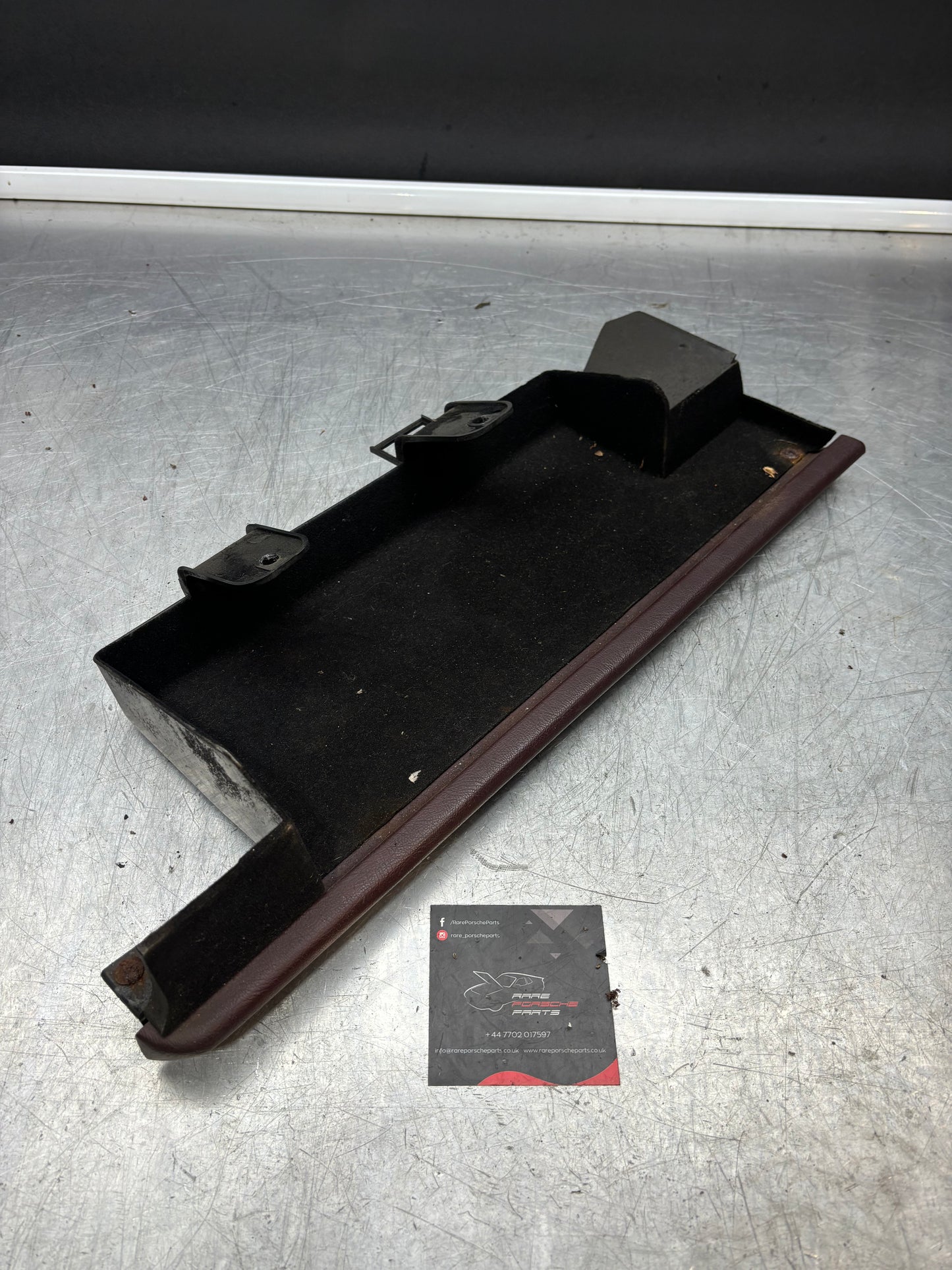 Porsche 928 under glove box shelf, burgundy 92755207702 RHD only, used