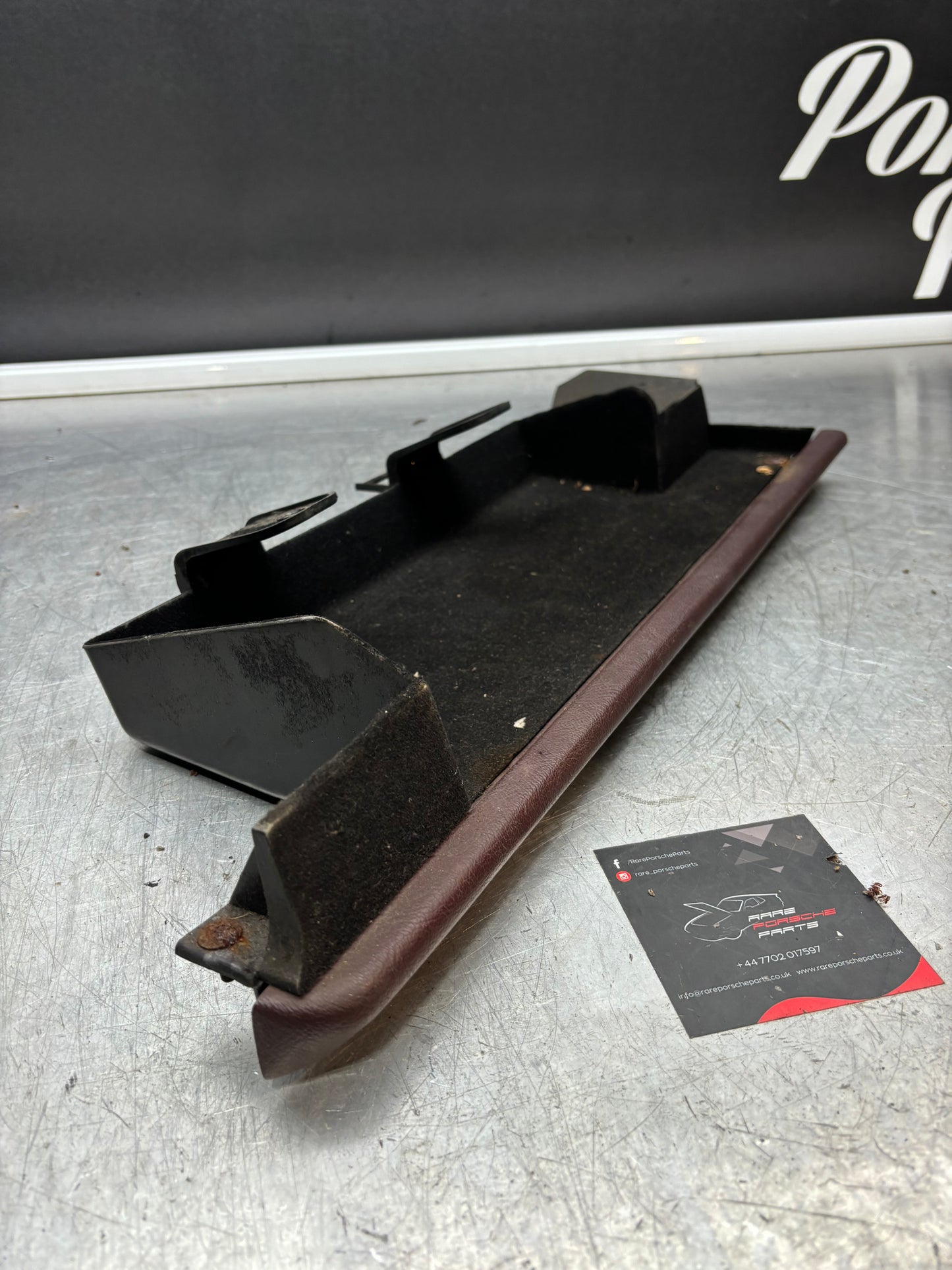 Porsche 928 under glove box shelf, burgundy 92755207702 RHD only, used