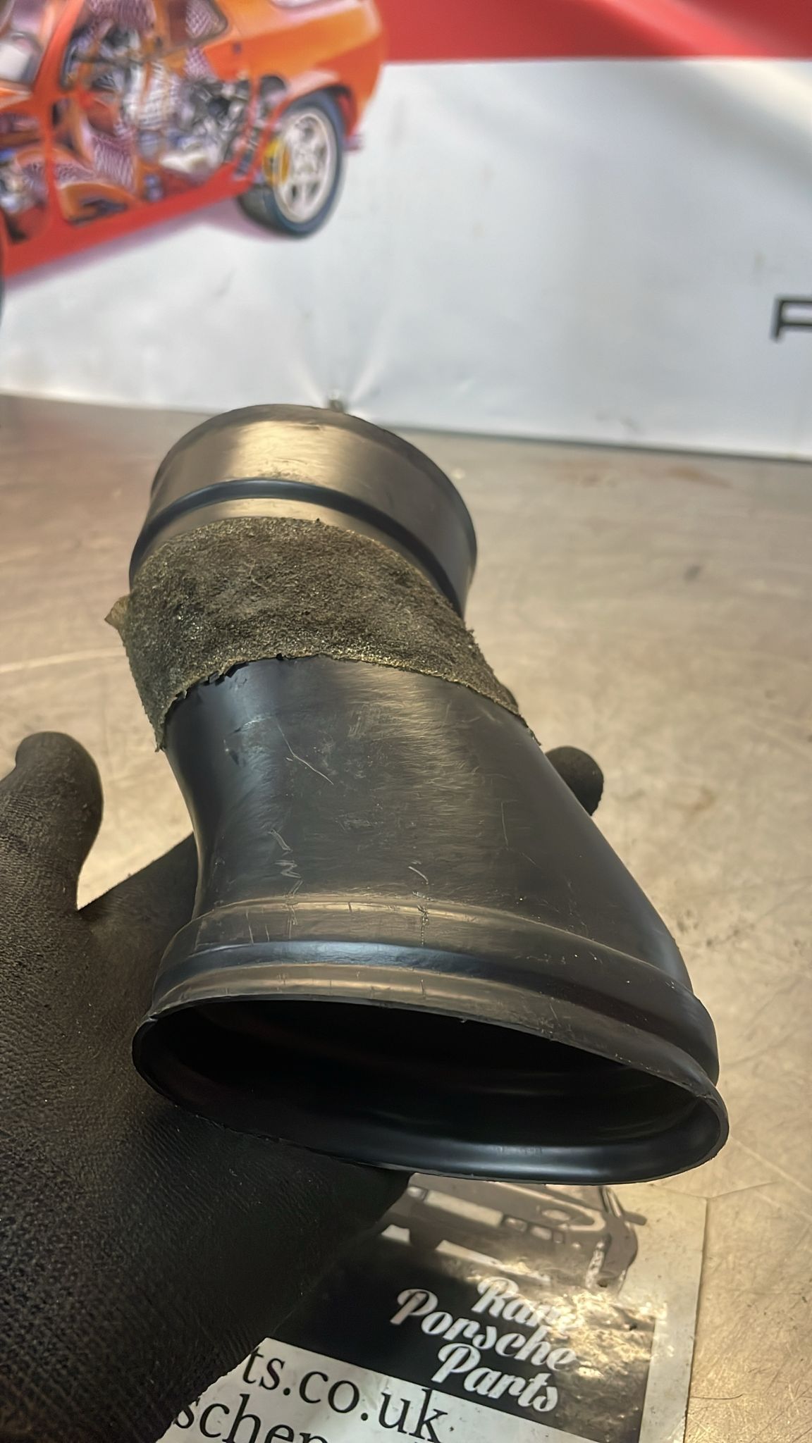 Porsche 944 left air duct, used 94457242700