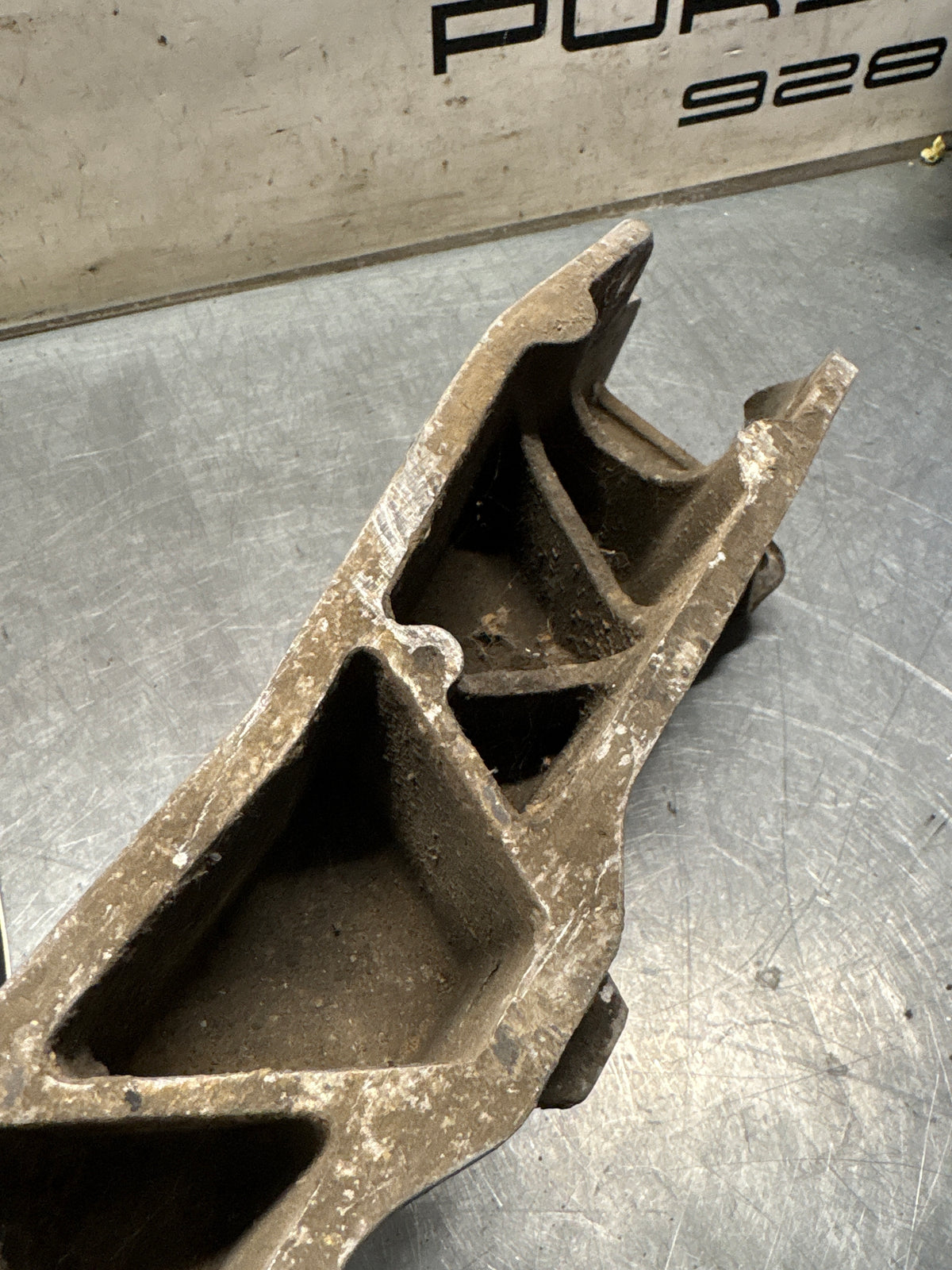 Porsche 944 Engine subframe bracket, 94434110301 Used