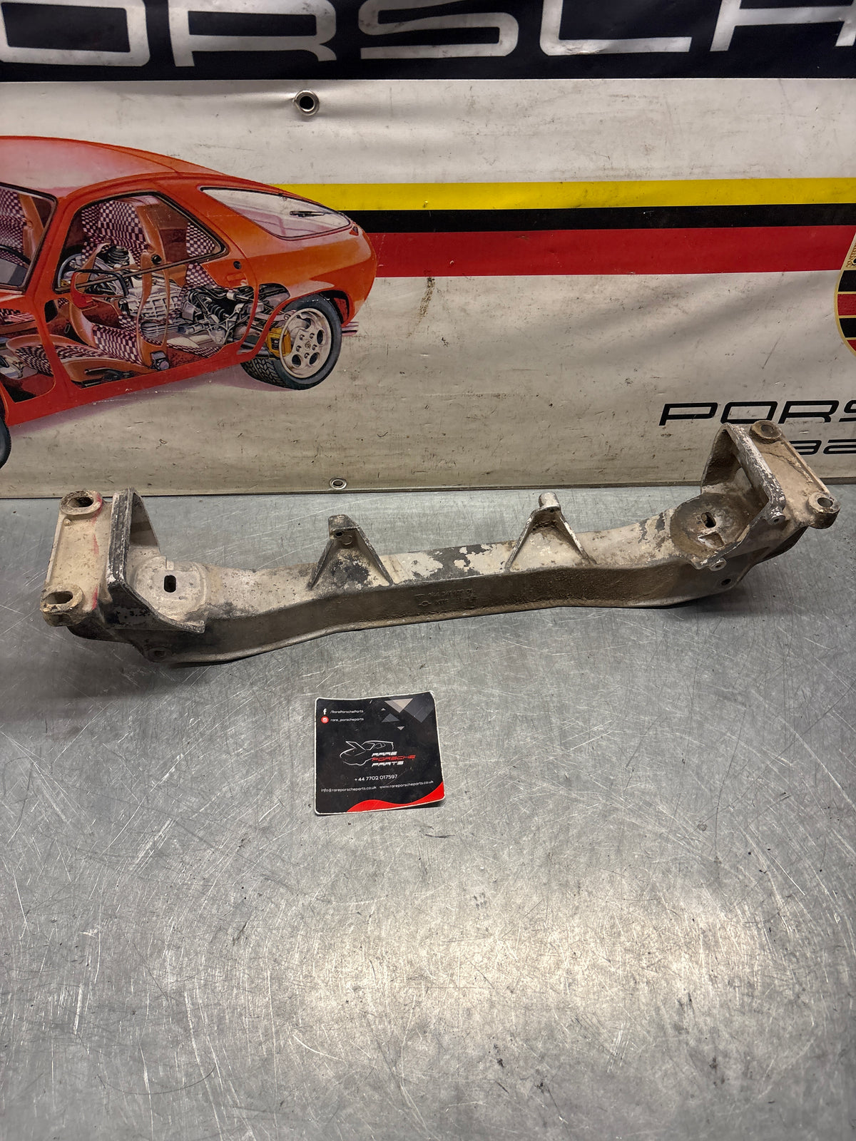 Porsche 944 Engine subframe bracket, 94434110301 Used