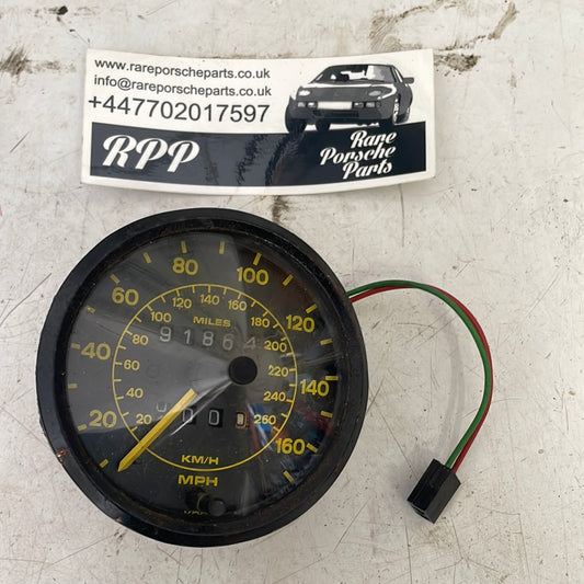 Porsche 944 speedometer showing 91864 miles 94464103600 yellow dial, spares or repair, used