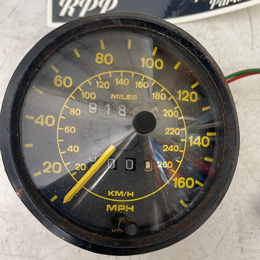 Porsche 944 speedometer showing 91864 miles 94464103600 yellow dial, spares or repair, used