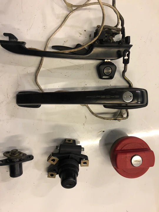 Porsche 944 lock set. Scripted handles. Fuel cap. Boot lock